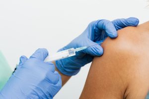 injection on the arm of a person