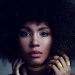 gorgeous young black woman with afro hair